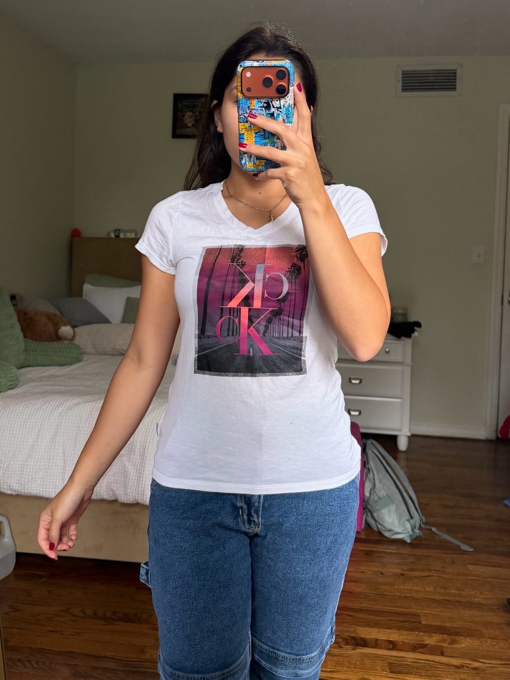 Calvin Klein Jeans White V-Neck Tee with Pink & Black Graphic